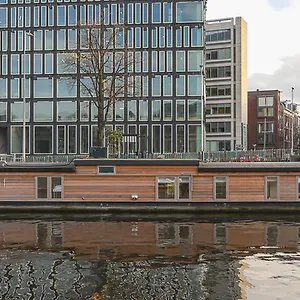 Houseboat Next To Amstel , Amsterdam Netherlands